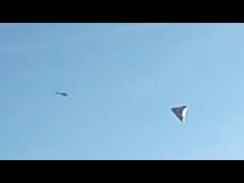 Youtube: Photos of Triangle UF0 with Helicopter near MacDill Air Force Base