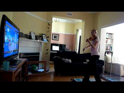 Youtube: Lara plays Dance Dance Revolution (DDR) and violin at the same time!!