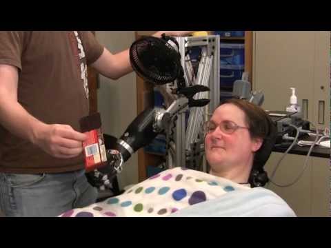 Youtube: Woman with Quadriplegia Feeds Herself Using Mind-Controlled Robot Arm | UPMC