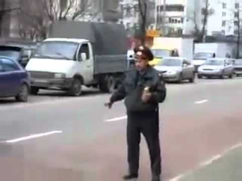 Youtube: Drunk Russian Police Man In Moscow