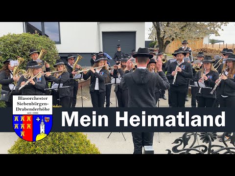 Youtube: Mein Heimatland (Marsch) |  Blasorchester Siebenbürgen-Drabenderhöhe | Maiblasen 2023