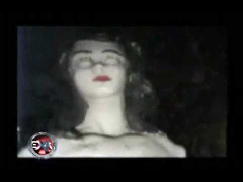 Youtube: Ghost Caught on video - Scary Statue Doll Opens Eyes