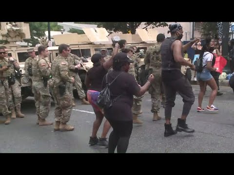 Youtube: Watch: National Guard members dance with protesters in Downtown Atlanta