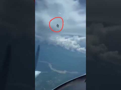 Youtube: UFO filmed from Plane Window