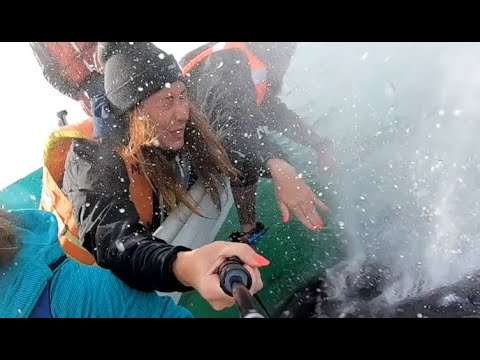 Youtube: Whale Sneezes On A Woman