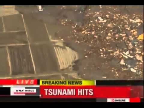 Youtube: Tsunami Japan strange Object UFO coming out the sea..
