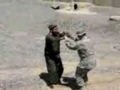 Youtube: afghan soldier dances with american soldier