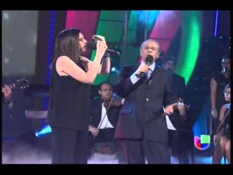 Youtube: LAURA PAUSINI Y LUCHO GATICA (Q.E.P.D.) cantan  "ES LA HISTORIA DE UN AMOR"