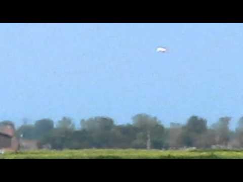 Youtube: UFO close to Viking Town hovering over farmland roadway