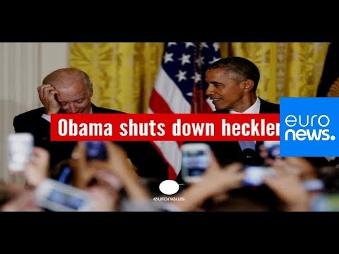 Youtube: "You're in my house" Obama shuts down a heckler during speech