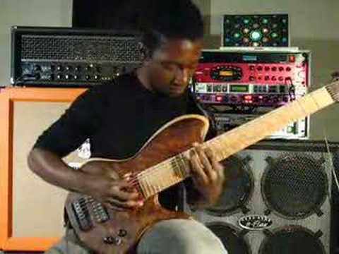 Youtube: Tosin Abasi playing custom 8 string guitar