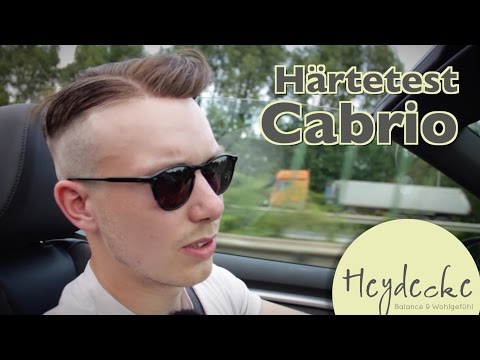 Youtube: Haarteil im Cabrio: Härtetest - Fliegt das Toupet beim Autobahn Wind weg?