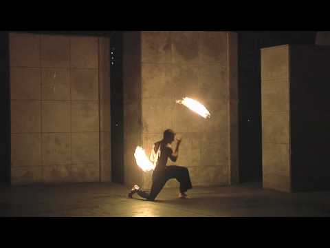 Youtube: Mark H fire dance demo;  deathstars, poi, staff, and double staff