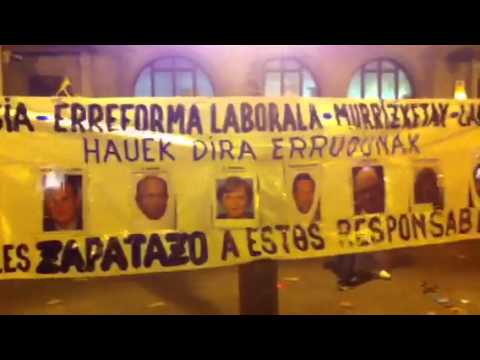 Youtube: Huelga 14-N: lanzan zapatos a Rajoy y Merkel