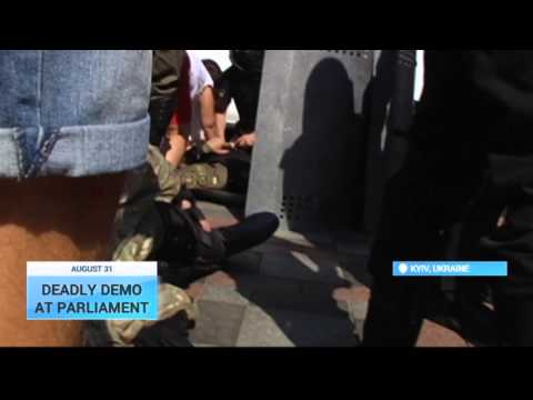 Youtube: Ukraine Parliament Clashes: Video catches grenade blast wounding TV journalist and police