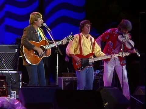 Youtube: John Denver & Nitty Gritty Dirt Band - Thank God I'm A Country Boy (Live at Farm Aid 1985)