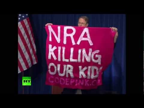 Youtube: 'NRA killing our kids!': Video of protesters disrupting NRA's LaPierre speech