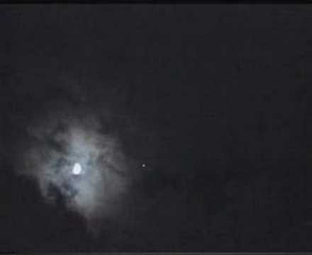 Youtube: Iridium flare on a cloudy night