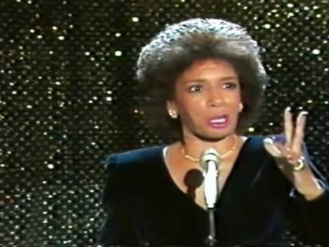 Youtube: Shirley Bassey - I Am What I Am (Original Arrangement) / SOMETHING (1984 Live)