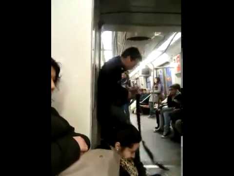 Youtube: Crazy guy playing guitar in train