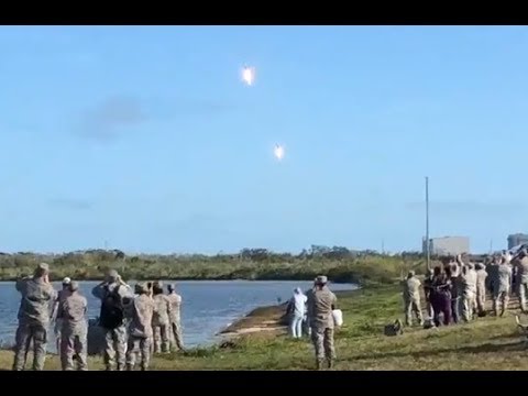 Youtube: Crazy crowd reactions to twin Falcon Heavy booster landing.