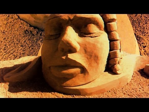 Youtube: LOOKS Like A Mars Ancient Head (BEACH Sand Sculptures!)