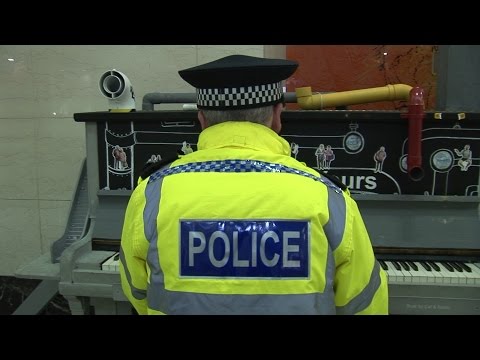 Youtube: POLICEMAN PLAYS PIANO (then walks away like a boss)