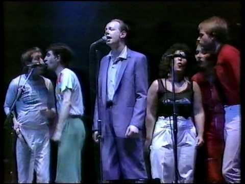 Youtube: Joe Jackson - Is She Really Going Out With Him? (Live, The Regal Theatre, Hitchin, 1983)