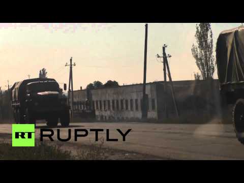 Youtube: Ukraine: DPR military vehicles withdraw from Donetsk frontline