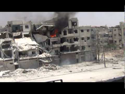 Youtube: حمص شارع القاهرة قصف على الحي دمار شامل 25-6-2012