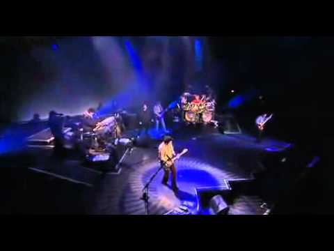 Youtube: Toto - "While My Guitar Gently Weeps"