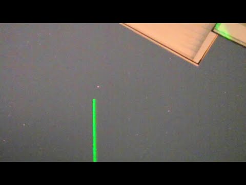 Youtube: Man Points At UFO With Laser Beam