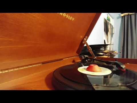 Youtube: Randy Newman- "Short People" (45 RPM)