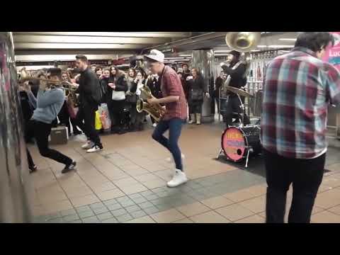 Youtube: the coolest saxophone subway band ever