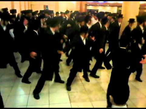 Youtube: Chasidim dancing at a wedding in Israel