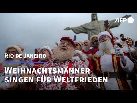 Youtube: Weihnachtsmänner in Rio singen für Frieden in der Welt | AFP