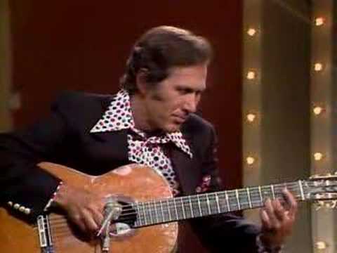 Youtube: "The Entertainer" played by Chet Atkins