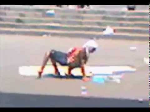 Youtube: Human/Hybrid creature walking through streets