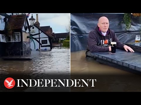 Youtube: Pub owner drinks pint in waist-deep water during Storm Henk floods