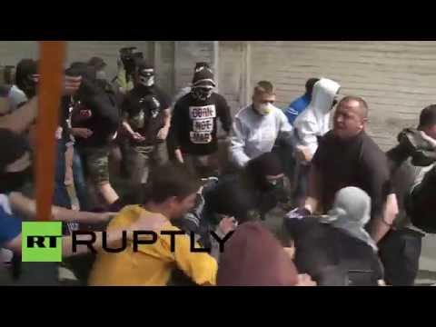 Youtube: Ukraine: Nationalists clash with anti-war march in Kiev