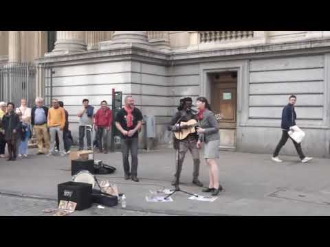 Youtube: Lampa FALY and Dasha Pearl in Bruxelles Place singing  Bob Marley song (Busker Reggae)