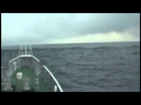 Youtube: Tsunami waves at sea footage captured by Coast Guard - March 11, 2011