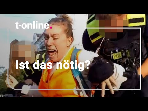 Youtube: "Letzte Generation" in Berlin: Polizei wendet Schmerzgriff an – Passant übt scharfe Kritik