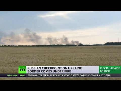 Youtube: Russian checkpoint on Ukraine border comes under fire