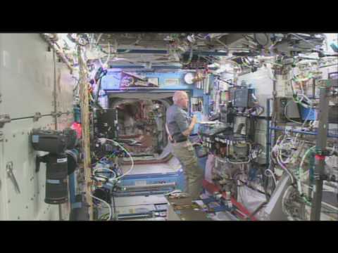 Youtube: SpaceX Dragon Attached to the Space Station
