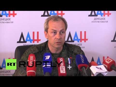 Youtube: Ukraine: Lentsov and OSCE observers attacked after finding illegal weapons cache - Basurin