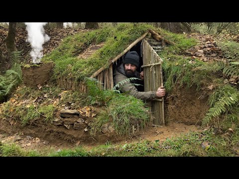 Youtube: Building complete and warm survival shelter | Bushcraft earth hut, grass roof & fireplace with clay