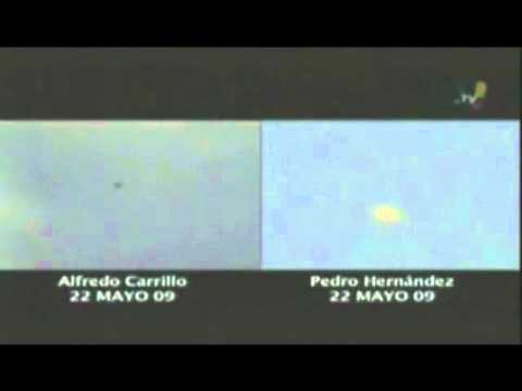 Youtube: Spinning UFO in Mexico City ejects dozens of spheres 05/22/2009