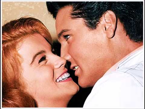 Youtube: Elvis Presley - Woman Without Love
