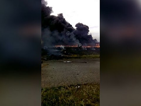 Youtube: Raw: Video Captures MH17 Crash Aftermath